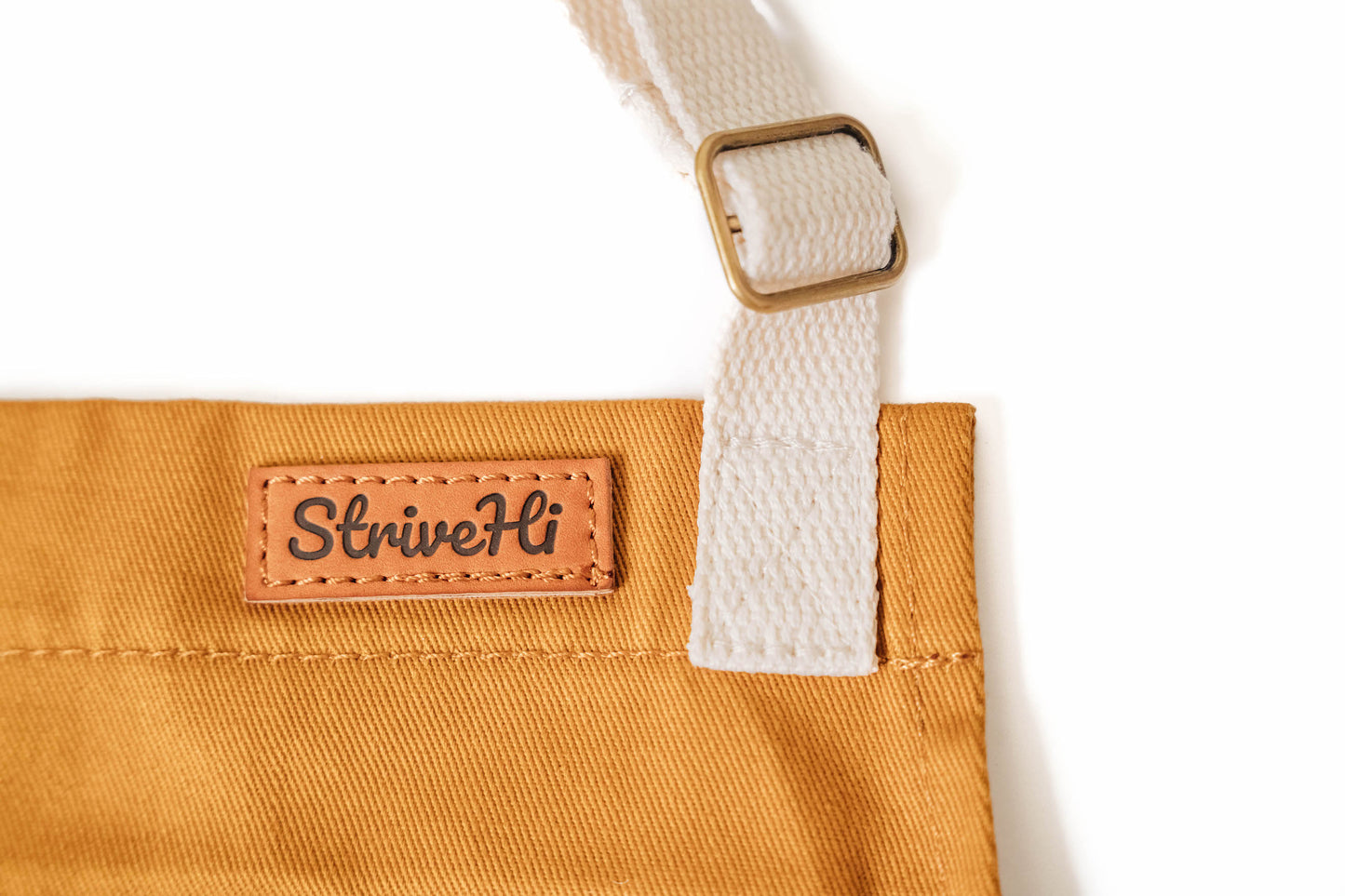 Child surf design apron Durable kids apron Soft fabric child apron Kids apron with leather accents Bronze detailed child apron Surf-themed children's apron Kids kitchen apron durable Leather strap kids apron Ocean design child apron Sturdy kids cooking apron Child apron with bronze accents High-quality kids apron Beach style children’s apron Kid-friendly surf apron